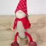 Dievčatko s červenou čiapkou sediace 17cm